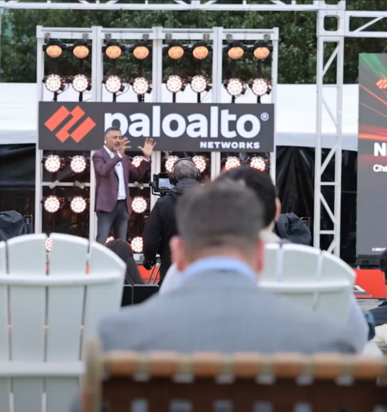 man giving presentation on stage